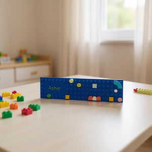 Colourful Lego-style bookmark with personalised text.