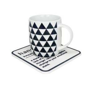 A black and white coaster with personalised name and description on the coaster.