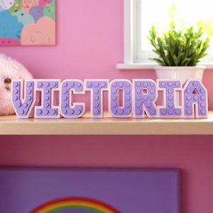 Colorful LEGO-style personalised name sign.