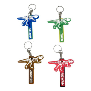 Dinosaur skeleton keychain with personalised name tag.