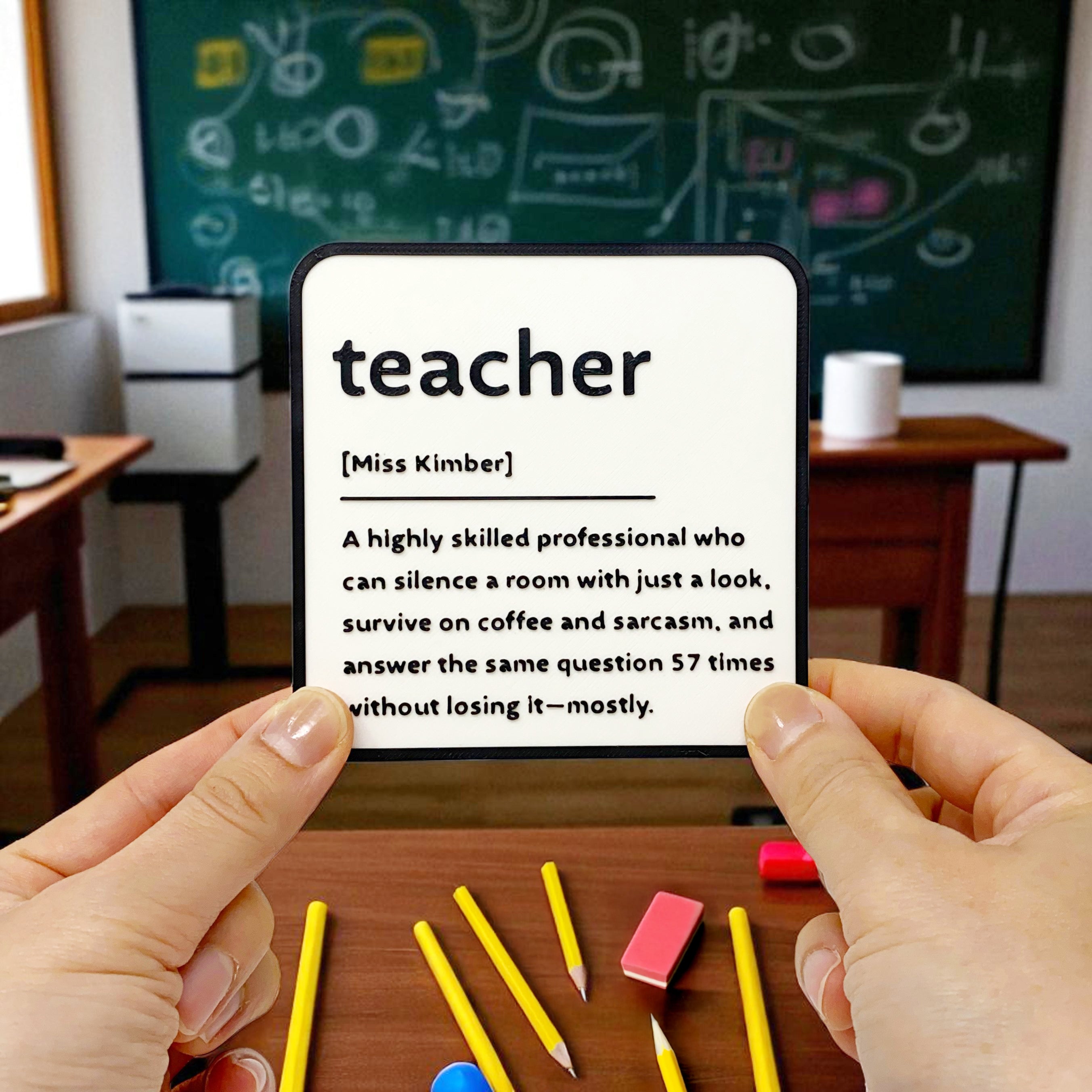 A black and white coaster gift for a teacher. Personalised name and description on the coaster.