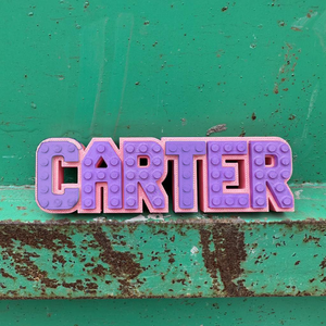 Colorful LEGO-style personalised name sign.