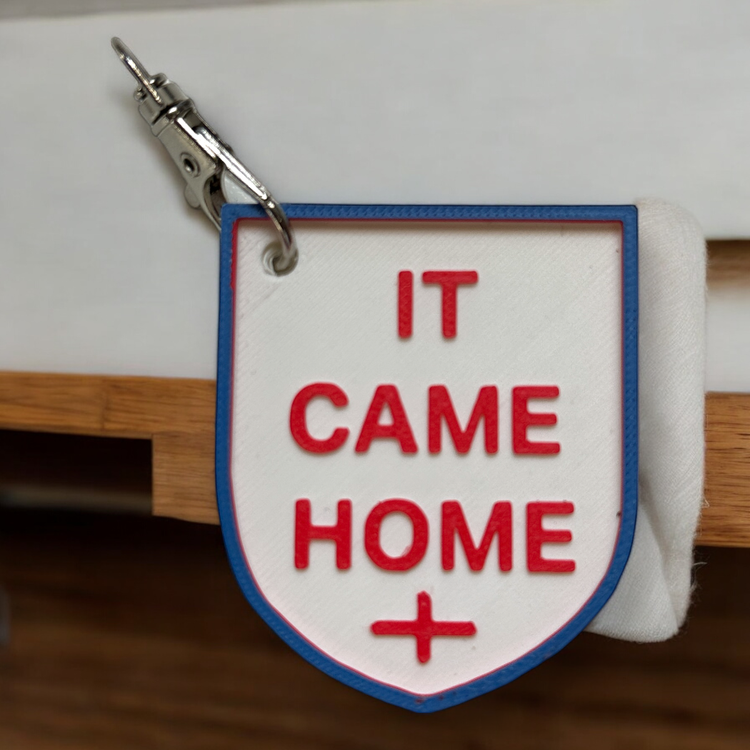 It's Come Home" Shield-Shaped Keyring - PLA Keychain with Engraved Design