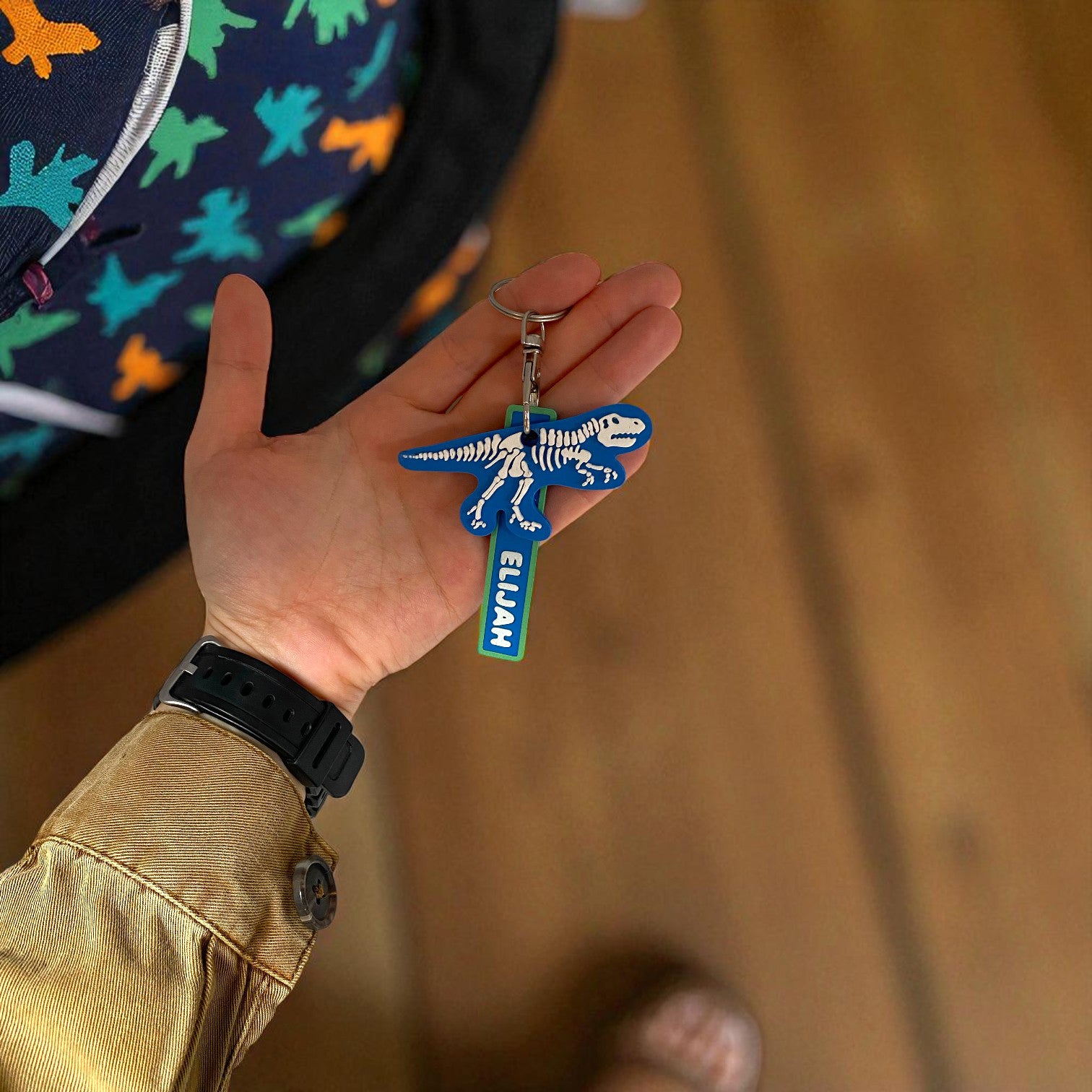 Dinosaur skeleton keychain with personalised name tag. 