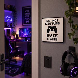Personalised Do Not Disturb gaming sign reading EVIE IS GAMING beside a bedroom door