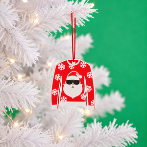 Santa Christmas jumper decoration hanging on a white tree